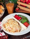 Potato gratin with lavash and grilled pepper.