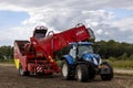 Potato grubbing machine with tractor in front