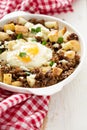 Potato hash with sausage and fried egg Royalty Free Stock Photo