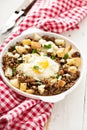 Potato hash with sausage and fried egg Royalty Free Stock Photo