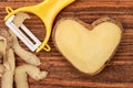 Potato heart over wooden background