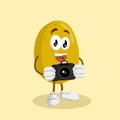 Potato mascot and background with camera pose Royalty Free Stock Photo