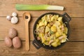 Potato with meat in a black cast iron pot Royalty Free Stock Photo