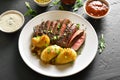Potato with medium rare roast beef Royalty Free Stock Photo