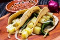 Potato Stew Tacos with Brown Beans