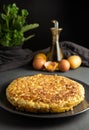 Potato omelet on dark wooden background - image Royalty Free Stock Photo