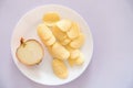 Potato onion chips on white wooden table, Top view