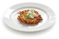 Potato pancake with sour cream