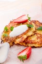 Potato pancakes with apfel and strawberry Royalty Free Stock Photo