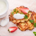 Potato pancakes with apfel and strawberry Royalty Free Stock Photo