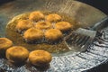 Potato pancakes fried in boiling oil. Royalty Free Stock Photo