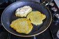 Potato pancakes in a pan Royalty Free Stock Photo