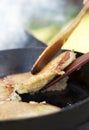 Potato pancakes frying process Royalty Free Stock Photo