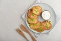 Potato pancakes or latkes or draniki with sour cream in plate Royalty Free Stock Photo