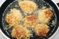 Potato Pancakes - Latkes Frying in Oil Royalty Free Stock Photo