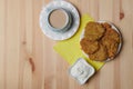 potato pancakes in a plate and a cup of coffee on a wooden background Royalty Free Stock Photo