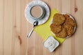potato pancakes in a plate and a cup of coffee on a wooden background Royalty Free Stock Photo