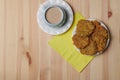 potato pancakes in a plate and a cup of coffee on a wooden background Royalty Free Stock Photo