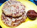 Potato Paratha with red chili sauce