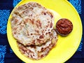 Potato Paratha with red chili sauce