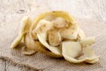 Potato peel on a jute cloth Royalty Free Stock Photo