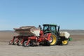 Farm equipment planting potatoes in an Idaho farm field. Royalty Free Stock Photo