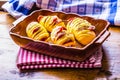 Potato.Roasts potatoes. Home cooking roasts potatoes. Baking pan full of baked potatoes stuffed with bacon sausage onions Royalty Free Stock Photo