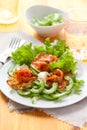 Potato rosti with smoked salmon and cucumber salad Royalty Free Stock Photo