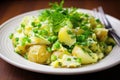 Potato salad with eggs and green onion Royalty Free Stock Photo