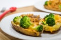 Potato Skins appetizer with broccoli, cheddar cheese and fried onions Royalty Free Stock Photo
