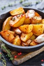 Potato slices baked with garlic, pepper and thyme.