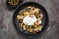 Potato and Spinach Hash with Cornichons Bacon and Poached Egg Royalty Free Stock Photo