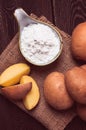 potato starch, on a wooden table, close-up, rustic style, no people,