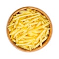 Salted potato sticks, shoestring potatoes, in a wooden bowl Royalty Free Stock Photo