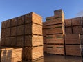 Potato storage facility. Wooden boxes used for potatoes and onions are stacked outside the warehouse. Royalty Free Stock Photo