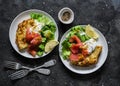 Potato tortilla with greek yogurt, smoked salmon and green salad. Delicious breakfast, appetizer, tapas