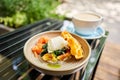 Potato waffles, Poached egg, avocado cream with salmon and egg . Healthy breakfast, protein. Restaurant dish. Royalty Free Stock Photo