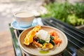 Potato waffles, Poached egg, avocado cream with salmon and egg . Healthy breakfast, protein. Restaurant dish. Royalty Free Stock Photo