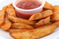 Potato wedges with ketchup