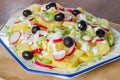 Potato and yogurt salad with black olives and radish Royalty Free Stock Photo