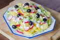 Potato and yogurt salad with black olives and radish Royalty Free Stock Photo