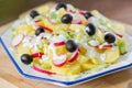 Potato and yogurt salad with black olives and radish Royalty Free Stock Photo