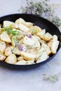 Potatoes on a baking sheet Royalty Free Stock Photo