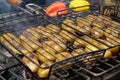 Potatoes broils in charcoal brazier. Fried potatoes. Potatoes are cooked Royalty Free Stock Photo