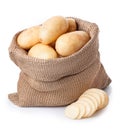 potatoes in burlap bag with sliced potato beside isolated on white Royalty Free Stock Photo