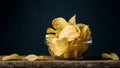 Potatoes Chips. Chips in glass bowl good for snack for beer or ale on natural wooden table. Good for beer festival, pub, restauran