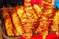 potatoes cut into a spiral and fried. tornado potato