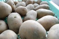 Close-up on a stack of potatoes on a market stall Royalty Free Stock Photo