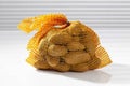 potatoes in a net. Royalty Free Stock Photo