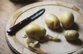 Potatoes peeled on a cutting board Royalty Free Stock Photo